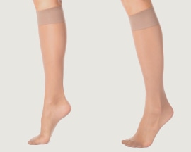 Ženské nohy s podpornými pančuchami na prevenciu žilovej nedostatočnosti